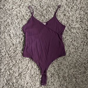 Super flattering body suit!